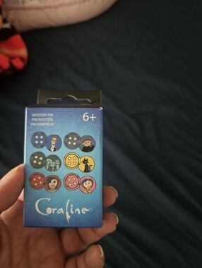 New in box  Coraline mystery Pin